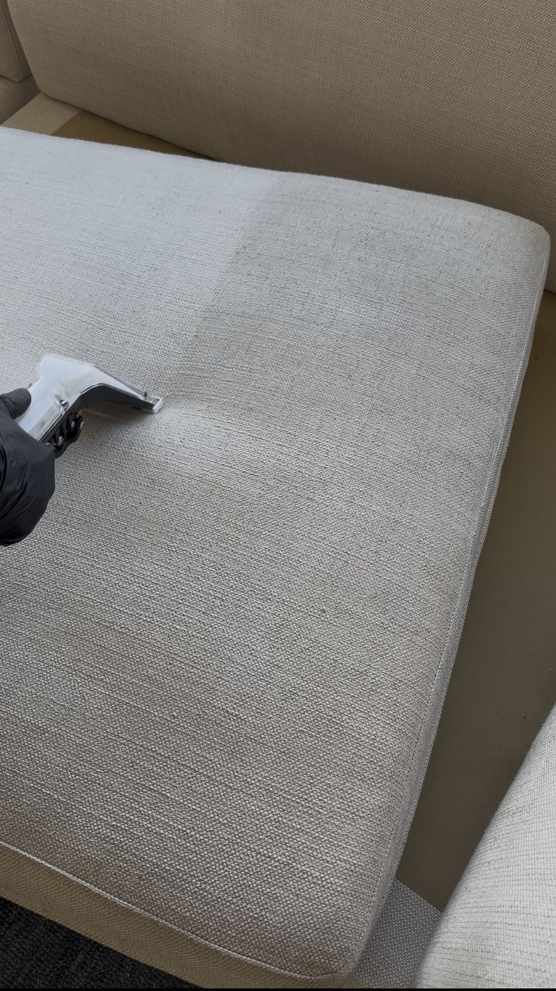 Light linen sofa after deep cleaning