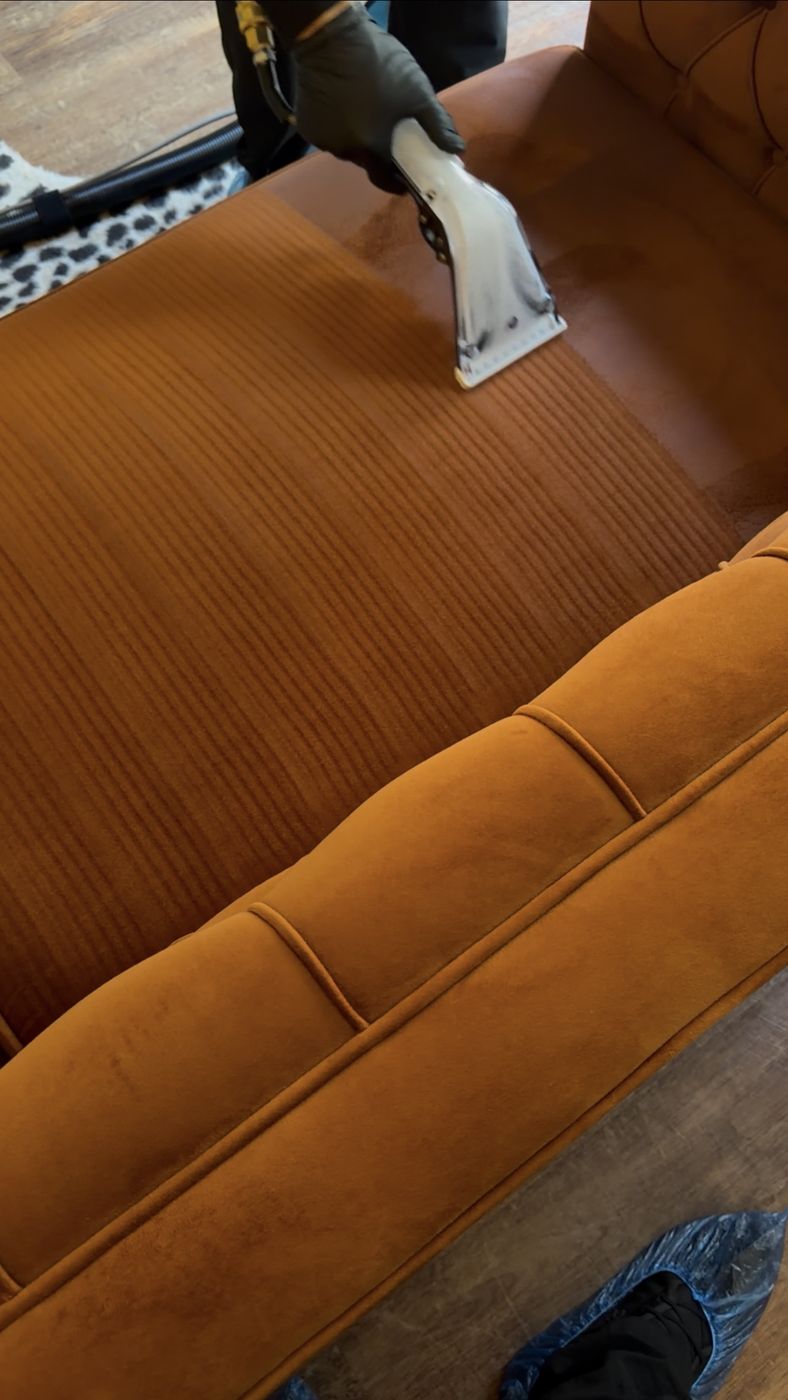 Rust velvet sectional during restoration cleaning
